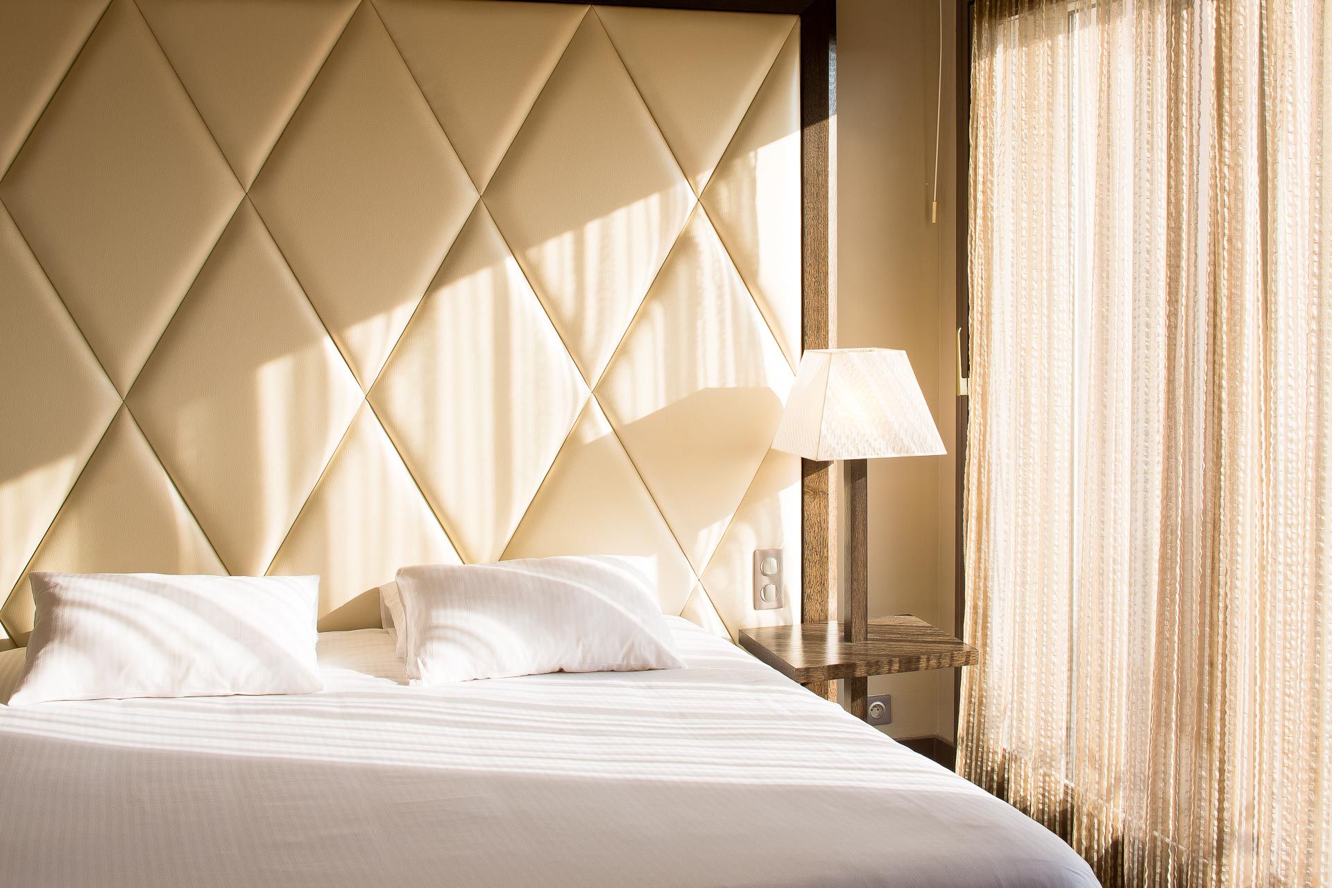 Zoom sur un lit de l'hôtel Safari